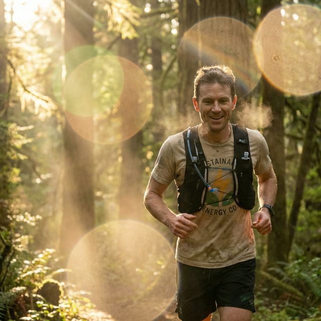 Person running through forest